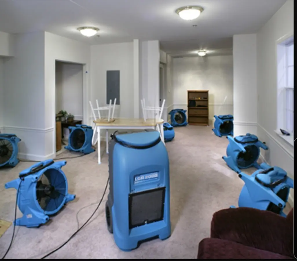 Air movers and dehumidifier setup for Water Damage Restoration in Pleasantville