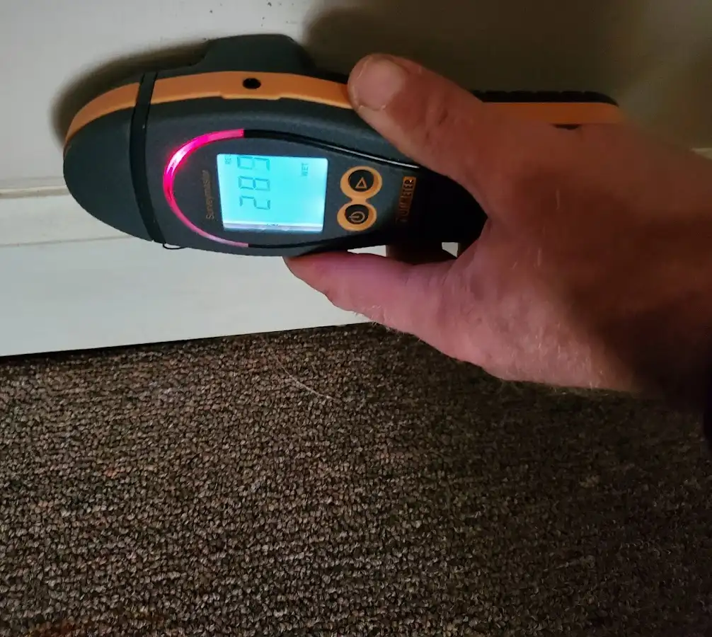 Moisture detection at baseboard during Sewage Cleanup & Sanitation in Pleasantville